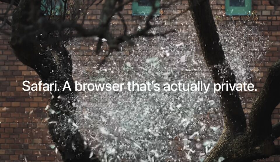 Advertisement claiming 'Safari. A browser that's actually private.' with a tree and brick wall in the background.